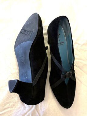 Thierry Rabotin black suede heels.